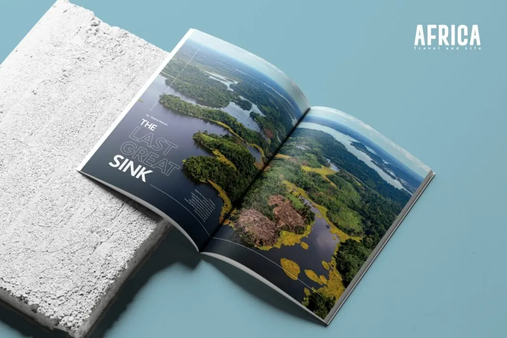 The magazine open on a concrete surface