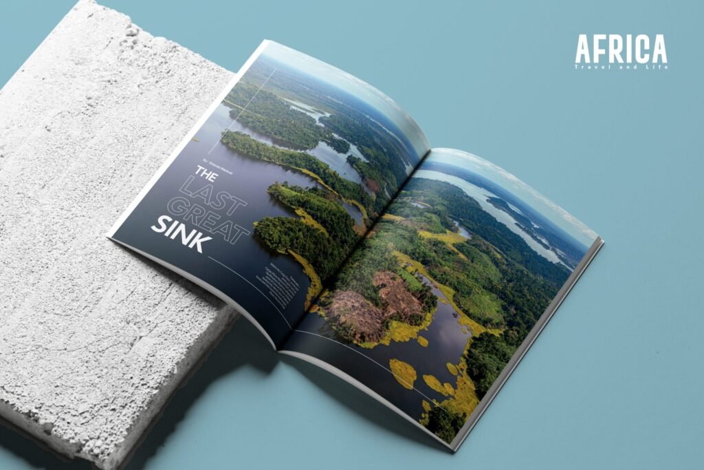 The magazine open on a concrete surface
